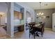 Elegant dining room with a built-in workspace, creating a seamless transition between dining and work areas at 5049 E Duane Ln, Cave Creek, AZ 85331