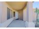 Inviting front entrance featuring a covered porch, natural lighting, and desert landscaping at 5049 E Duane Ln, Cave Creek, AZ 85331