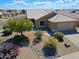 Landscaped front yard with desert plants and stone accents at 5049 E Duane Ln, Cave Creek, AZ 85331