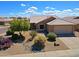 Charming home featuring desert landscaping, a tile roof, and an attached two-car garage at 5049 E Duane Ln, Cave Creek, AZ 85331