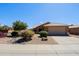 Inviting home with desert landscaping, drought-resistant plants, and a two-car garage at 5049 E Duane Ln, Cave Creek, AZ 85331
