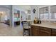 Bright kitchen with a breakfast bar, light countertops, and a view into other living spaces, ideal for entertaining at 5049 E Duane Ln, Cave Creek, AZ 85331