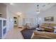 Bright living room with tile and carpet floors, open floor plan, and ample seating at 5049 E Duane Ln, Cave Creek, AZ 85331