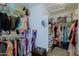 Spacious walk-in closet with ample hanging space for clothing and personal items at 5049 E Duane Ln, Cave Creek, AZ 85331