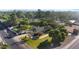 View of the home highlighting the pool, mature trees and proximity to neighborhood at 5339 E Osborn Rd, Phoenix, AZ 85018