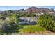 Aerial view of backyard, pool and lawn, with a mountain view at 5339 E Osborn Rd, Phoenix, AZ 85018