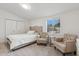 Cozy bedroom features a neutral color palette, comfortable seating, and ample natural light at 5339 E Osborn Rd, Phoenix, AZ 85018
