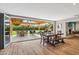 Dining room showcasing folding glass doors which lead to a covered patio and backyard at 5339 E Osborn Rd, Phoenix, AZ 85018