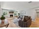 Spacious living room with a fireplace, hardwood floors, and plenty of natural light at 5339 E Osborn Rd, Phoenix, AZ 85018