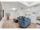 Open-concept living room boasts sleek floors, neutral walls, and abundant natural light at 5339 E Osborn Rd, Phoenix, AZ 85018