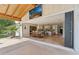Open living space showcasing the kitchen, dining area, and backyard through large bi-fold doors at 5339 E Osborn Rd, Phoenix, AZ 85018