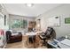 Home office with hardwood floors, large window, office furniture, and natural light at 5339 E Osborn Rd, Phoenix, AZ 85018