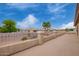 Extended balcony featuring neutral color and an impressive view to the water feature below at 5510 N 132Nd Dr, Litchfield Park, AZ 85340