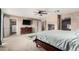 Bright and airy bedroom featuring carpet and direct access to a walk-in closet at 5510 N 132Nd Dr, Litchfield Park, AZ 85340