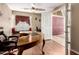 Beautiful home office with hardwood floors and built-in window seating at 5510 N 132Nd Dr, Litchfield Park, AZ 85340