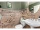 Charming powder room with decorative tile work and elegant fixtures at 5510 N 132Nd Dr, Litchfield Park, AZ 85340