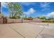 Tennis court with basketball hoop at 5510 N 132Nd Dr, Litchfield Park, AZ 85340