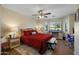 Inviting bedroom with large windows, wood floors, ceiling fan, and a serene atmosphere at 5830 E Mckellips Rd # 2, Mesa, AZ 85215