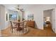 Charming dining room with a wooden table, four chairs, and natural light, perfect for Gathering meals and gatherings at 5830 E Mckellips Rd # 2, Mesa, AZ 85215