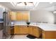 Well-lit kitchen with stainless steel appliances, bright countertops, and ample cabinetry at 5830 E Mckellips Rd # 2, Mesa, AZ 85215