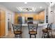 Spacious kitchen features breakfast bar, stainless steel appliances, and neutral countertops at 5830 E Mckellips Rd # 2, Mesa, AZ 85215