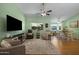 Bright living room showcasing an open floor plan, multiple seating areas, and abundant natural light at 5830 E Mckellips Rd # 2, Mesa, AZ 85215