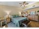 Comfortable main bedroom with soft lighting, neutral colors, and a ceiling fan at 5830 E Mckellips Rd # 2, Mesa, AZ 85215