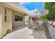 Outdoor patio area with table, chairs, and umbrella, perfect for relaxing at 5830 E Mckellips Rd # 2, Mesa, AZ 85215