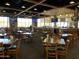 Lively restaurant area with bar, multiple TVs, and comfortable seating arrangements at 5830 E Mckellips Rd # 2, Mesa, AZ 85215
