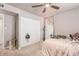 Bedroom featuring carpeted floor, ceiling fan, and closet at 5913 E Thomas Rd, Scottsdale, AZ 85251