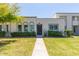 Charming single story home with manicured lawn and attractive landscaping at 5913 E Thomas Rd, Scottsdale, AZ 85251