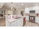 This renovated kitchen showcases stylish granite countertops, updated appliances, and an eat-in bar area at 5913 E Thomas Rd, Scottsdale, AZ 85251