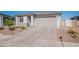 Beautiful single-story home featuring a paved driveway and desert landscaping for a modern and low-maintenance appeal at 6117 S Adelle --, Mesa, AZ 85212