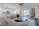 Spacious living room showcasing an open layout, neutral tones, and seamless access to the backyard at 6117 S Adelle --, Mesa, AZ 85212