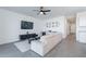 Contemporary living room featuring a comfortable sofa, sleek furniture, and modern decor at 6117 S Adelle --, Mesa, AZ 85212
