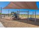 Community playground with shade structure, play equipment and surrounding bench seating at 6117 S Adelle --, Mesa, AZ 85212