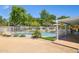 Fenced backyard showcases a sparkling pool, patio, and landscaping, perfect for outdoor living and entertaining at 7042 N 13Th St, Phoenix, AZ 85020