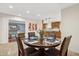 Open concept dining room that flows into kitchen and living areas at 7042 N 13Th St, Phoenix, AZ 85020