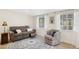 Cozy living room with natural light and a view of the pool at 7042 N 13Th St, Phoenix, AZ 85020