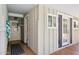 Extended outdoor patio with multiple access points into the home at 7042 N 13Th St, Phoenix, AZ 85020