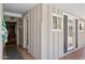 Extended outdoor patio with multiple access points into the home at 7042 N 13Th St, Phoenix, AZ 85020