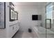 Luxurious bathroom featuring a soaking tub, glass shower, and dual vanity sinks at 7347 E Vista Bonita Dr, Scottsdale, AZ 85255