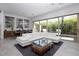 Spacious living room with open floor plan, dining area, and sliding glass doors to patio at 7347 E Vista Bonita Dr, Scottsdale, AZ 85255