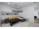 Cozy living room with comfortable sectional, plush rug, and gallery wall at 7347 E Vista Bonita Dr, Scottsdale, AZ 85255