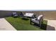 Rooftop terrace featuring modern outdoor seating and artificial turf, perfect for entertaining at 7347 E Vista Bonita Dr, Scottsdale, AZ 85255