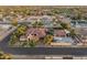 Expansive property featuring a custom home, garage, sparkling pool, and well-maintained grounds in a serene neighborhood at 7425 W Caro Rd, Glendale, AZ 85308