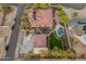 Aerial perspective of a home highlighting the pool, patio area, and well-maintained landscaping at 7425 W Caro Rd, Glendale, AZ 85308