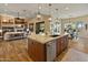 Beautiful kitchen features a large island, granite countertops, and open-concept layout at 7425 W Caro Rd, Glendale, AZ 85308