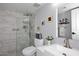 Updated bathroom with a glass-enclosed shower, modern fixtures, and stylish tile work at 7950 E Camelback Rd # 308, Scottsdale, AZ 85251