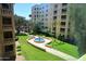 Scenic view of the property's landscaped courtyard and fountain, offering a serene outdoor space at 7950 E Camelback Rd # 308, Scottsdale, AZ 85251